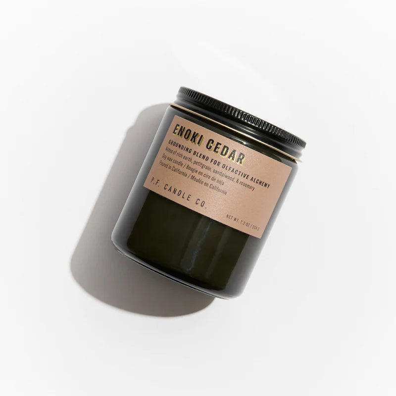 A grounding blend to activate deep relaxation, with notes of rich earth, petitgrain, sandalwood, and rosemary. Inspired by regenerative walks through verdant woods, formulated with upcycled patchouli and a proprietary fragrance technology inspired by nature’s positive affect on mood and wellbeing.  evoke cedar PF Candle