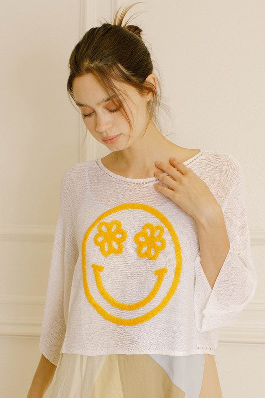 smiley face daisy eye embroidered top